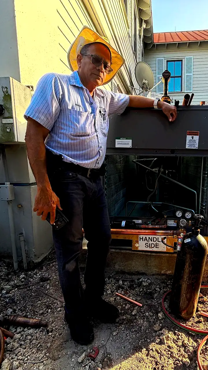 Divino Air techs working on AC units
