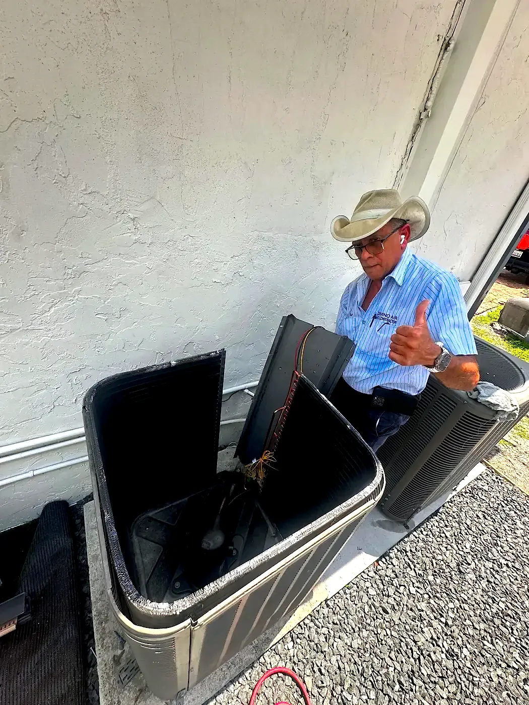 The owner giving a thumbs-up next to a unit